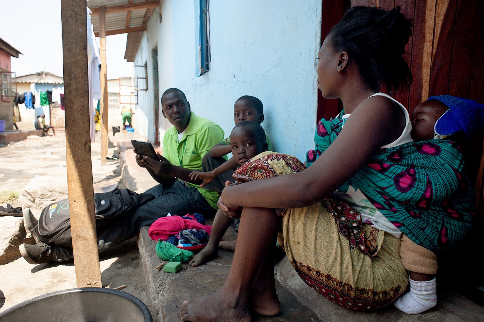 TREATS community worker with family