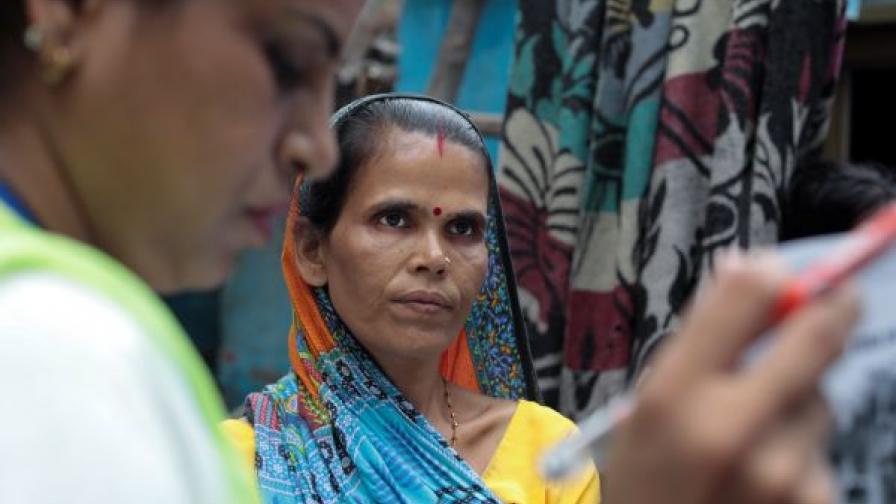 Raja, who was undertaking treatment for TB, is visited by volunteers as part of Project Axshya in New Delhi.