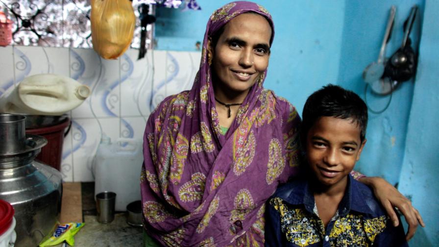 Mother and child during Project Axshya Plus community visit in India